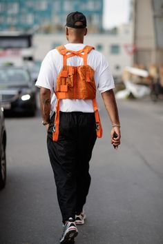 Prada's Half-and-Half Shirt Reigns Supreme at Copenhagen Fashion Week SS19 | Highsnobiety Copenhagen Fashion Week Street Style, Half Shirt, Utility Vest, Copenhagen Fashion, Half Shirts, Copenhagen Fashion Week, Half And Half, Men Street, Fashion Week Street Style