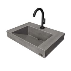 a concrete sink with a black faucet