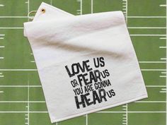 a towel with the words love us, fear us, you are going to hear us on it