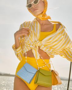 An essential accessory for modern women designed from nature to bring a pop of colour to your outfits 🍋 #LadayMiaMini #Fundao Beach Outfit Yellow, Fanta Lemon, Colorful Aesthetic, Swimsuit Collection, Summer Photoshoot, Swim Trends, Summer Dress Outfits