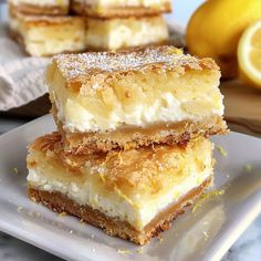 three lemon bars stacked on top of each other