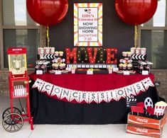 a movie themed birthday party with balloons and decorations