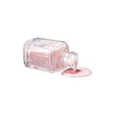 a bottle of pink nail polish being poured onto it