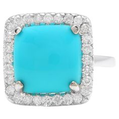 3.60 Carats Impressive Natural Turquoise and Diamond 18K White Gold Ring Suggested Replacement Value $4,500.00 Total Natural Oval Turquoise Weight is: Approx. 3.20 Carats Turquoise Measures: 10.00 x 10.00mm Natural Round Diamonds Weight: Approx. 0.40 Carats (color G-H / Clarity SI1-SI2) Ring size: 7 (free re-sizing available) Ring total weight: 4.5 grams Disclaimer: all weights, measurements and colors are approximate and may vary slightly from the listed dimensions or as seen in the image. All White Gold Ring, Natural Turquoise, White Gold Rings, Cocktail Rings, Gold Ring, Round Diamonds, Gold Rings, Jewelry Rings, Ring Size