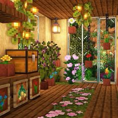 a room filled with lots of plants and flowers