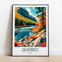 a poster with the name quebec on it in front of a white wall