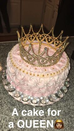 a pink cake with a crown on top that says, acake for a queen