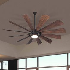 a ceiling fan with wooden blades hanging from the ceiling