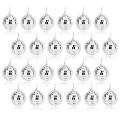 twelve shiny silver christmas ornaments on white background