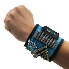 a person's arm with an assortment of screwdrivers on it and a wristband