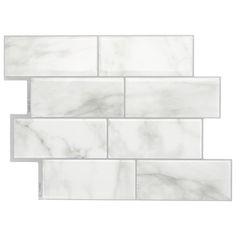 white marble subway tile on a white background