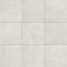 a white tile wall with several squares in the middle and one square at the top