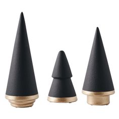 three black cones with gold tips on white background