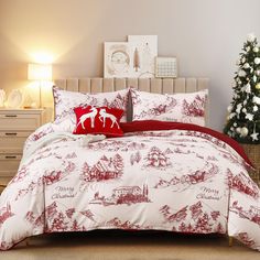 a red and white bed with christmas decorations on it