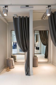 black and white photograph of a room with curtains