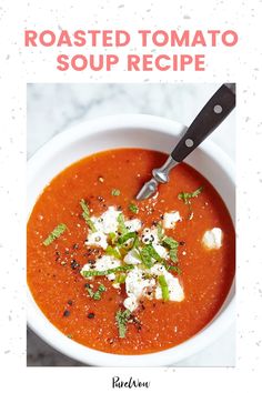 roasted tomato soup recipe in a white bowl with a black spoon on the side and text overlay that reads roasted tomato soup recipe