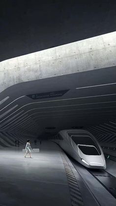 a person walking through a tunnel with a train in the background