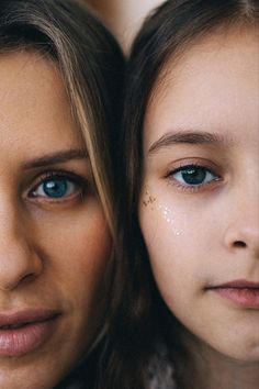 two women with blue eyes are looking at the camera