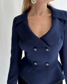 This classic Thierry Mugler blazer is a seriously timeless investment, with so many signature Mugler details making it a highly collectible piece: the exaggerated nipped waist with flared hips, the dramatic lapels, and the anchor details. Mugler drew upon nautical motifs throughout his career, most notably with his 1989 Les Atlantes collection. The navy blue shade is a more unusual take on a classic black evening jacket. There are slight shoulder pads and thoughtful tailoring which enhance the f Mugler Blazer, Vintage Thierry Mugler, Crystal Statement Earrings, Waist Jacket, Evening Jacket, Navy Blue Jacket, The Anchor, Evening Jackets, Thierry Mugler