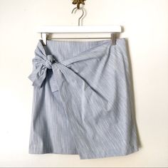 New Without Tags! Anthropologie Maeve Light Blue Wrap Skirt Bow Tie Detail On Side Mini Length Back Zip Closure Size 6 Skirt Has Lots Of Stretch! No Flaws Of Any Kind All Prices Are Negotiable Chic Blue Lined Wrap Skirt, Chic Fitted Blue Wrap Skirt, Blue Cotton Skirt For Brunch, Spring Workwear Mini Wrap Skirt, Blue Pencil Skirt Skort For Summer, Elegant Blue Skort For Summer, Blue Pencil Skirt For Day Out, Blue Pencil Skirt Skort For Spring, Blue Wrap Skirt