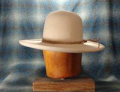 Please be sure to read all shop info and the FAQ's before measuring your head and placing an order as we are not able to offer returns or exchanges on our custom-built hats. The Historic Ranchero is the iconic open crowned fur felt hat of history. It has a "tall crown" of approximately of 5 1/2" and a standard brim of approximately 3 1/2 - 4". This hat can be seen in the photos and paintings of our nation's history. It differs from the Ranchero in that the brim is flat except for the pencil curl Wide Brim Cowboy Hat, Custom Flat Brim Hats For Ranch, Classic Handmade Hats With Curved Brim, Handmade Classic Hat With Curved Brim, Custom Brimmed Ranch Hats, Custom Brimmed Fedora For Ranch, Classic Handmade Hat With Flat Brim, Custom Fedora With Curved Brim For Rodeo, Artisan Fitted Hats With Curved Brim