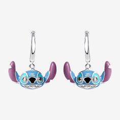 disney pikachu earrings with purple and blue enamel on the ends, hanging from silver hooks