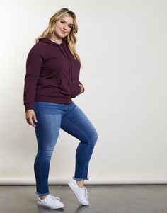 Our Curve Laid-Back Hoodie has a comfy, casual style and a super soft feel that you can't live without! This hoodie has long sleeves, a drawstring hoodie, and a roomy front kangaroo pocket. It's made from an extremely smooth knit fabric that is lightweight and full of stretch for day to night comfort. This sweatshirt is made from 57% Cotton, 38% Polyester, and 5% Spandex. Recommended to hand wash cold. Imported. All models are wearing a size 1XL. The knit material is stretchy and is designed to Plus Size Comfy Outfits, Plus Size Outfits With Sneakers, Plus Size Outfits Casual, Plus Size Fall Outfit, Plus Size Fall, Classy Casual Outfits, Curvy Girl Outfits, Curvy Outfits, Drawstring Hoodie