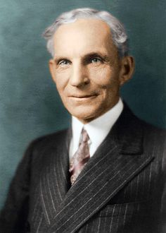 an old photo of a man in a suit and tie with grey hair wearing a striped vest