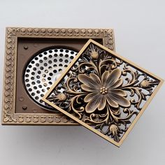 two decorative objects are sitting in a box