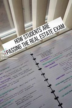 an open notebook with the words how students are passing the real estate exam on it