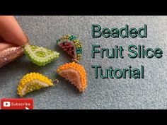 the beaded fruit slice is being made with beads