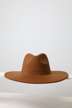 Enhance your style this fall and winter with our large wide brim solid color Fedora - it comes with 18 different colors and its quality and structure of hat for both fashion and functionality. Size: Brim: 4 inches wide Size: Large Hat Size: 7.1/4 - 7. 5/8 Inches: 22.75- 23 CM: 58-59 Key Features: Classic Solid Colors: This plain fedora serves as a blank canvas, allowing you to customize and design it to suit your unique style. Versatile Fashion: The timeless design of this Classic Fedora is perf Brown Sun Hat For Fall, One Size Fits Most, Trendy Solid Color Sun Hat With Curved Brim, Trendy Solid Color Sun Hat, Trendy One Size Fits Most Solid Color Sun Hat, Brown Brimmed Sun Hat For Fall, Brown Sun Hat With Short Brim For Fall, Brown Short Brim Sun Hat For Fall, Solid Flat Brim Felt Hat For Spring, Brown Curved Brim Panama Hat For Winter