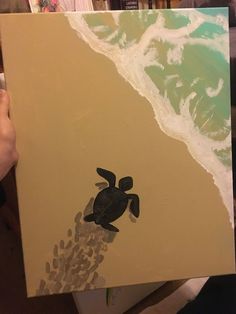 a painting of a turtle coming out of the ocean