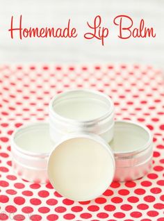 homemade lip balm on a polka dot tablecloth with text overlay that reads homemade lip balm