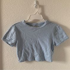 Urban Outfitters Baby Tee Uo Cropped Blue T-Shirt Basic Essential New Without Tags Worn Once Very Cropped, Sits Above Bellybutton Baby Blue, No Stains Solid Color Cotton Crop Top, Casual Cropped Solid Color Tops, Basic Plain Cotton Crop Top, Basic Light Wash Cotton Tops, Blue Fitted Basic Tops, Fitted Blue Basic Tops, Blue Crew Neck Crop Top, Cropped Cotton Solid Color Tops, Trendy Cropped Top In Light Wash