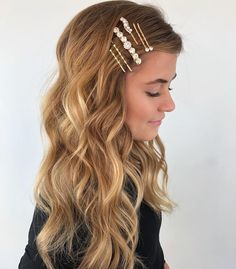 Beautiful sparkly hair clips on long curled hair. Get ready for the holidays with these 10 gorgeous holiday hairstyles! From Christmas hair inspo to chic ponytails, curls, and festive hair ideas, these looks are perfect for any celebration. Whether you need last-minute glam or creative hair ideas, you'll love these trending styles! 🎀✨ #HolidayHairstyles #ChristmasHair #HairInspo #HairIdeas #FestiveLooks