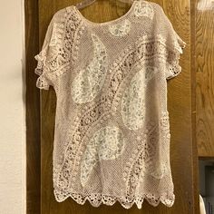 Exquisitely Hand Designed And Crocheted, Light Cream Top. Nwot. Intricately Detailed With Sparking Sequins. 190% Cotton. See Through. Chic And Unique. 20” Armpit To Armpit. 30” Long (To Bottom Of Scallop). Smoke Free Home. Elegant Beige Tops With Crochet Trim, Elegant Open Knit Cotton Top, Beach Beige Lace Top With Lace Trim, Beige Lace Trim Top For Beach, Casual Lace Top With Lace Trim For Beach, Casual Lace Trim Top For Beach, Beige Lace Top For Day Out, Chic Crochet Top For Beach With Crew Neck, Beige Crochet Trim Lace Top For Beach