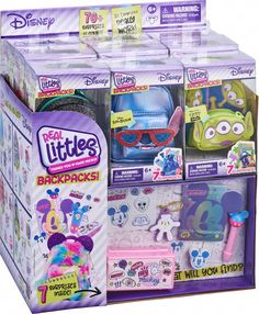 a display case filled with lots of littlest toys in it's packaging boxes