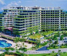 an aerial view of the resort and pool area