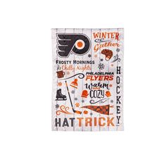 a white towel with an orange and black pattern on the front that says, winter is coming