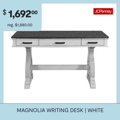 a white desk with black top and two drawers on the bottom, $ 699 00 reg