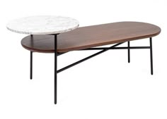 two tables with marble top and black metal legs, one on each side the other