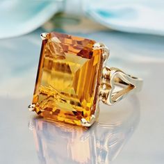 10.50 Carat Natural Citrine 14k Solid Gold Ring Ring Material: 14k Solid Gold Total Metal Weight: 4.5 Grams Gemstone: Natural Citrine Gemstone Color: Yellow Gemstone Shape: Emerald Cut Gemstone Dimensions: 16.00x12mm Gemstone Carat Weight: 10.50 Carat Gemstone Quantity: 1 Ring Quantity: One Condition: New Delivered in an elegant gift box Made in the USA 💜 Please do not hesitate to ask any questions and we will be happy to assist You 💜 Topaz And Citrine, Citrine Jewelry, Jewellery Box Making, Yellow Gemstones, Solid Gold Ring, Ring Emerald, Citrine Ring, Natural Citrine, Solid Gold Rings