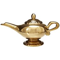 a golden teapot with a handle on it