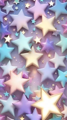 many different colored stars on a purple background