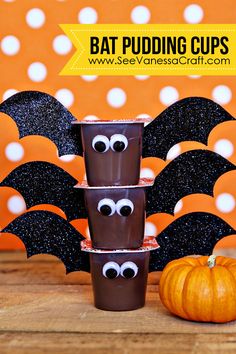 chocolate cups decorated with bats and eyes for halloween