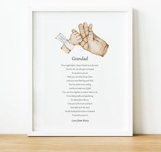 a white framed poster with a hand holding a knife in it's right hand