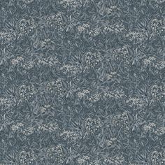 an image of a blue and white wallpaper with small flowers on the top right side