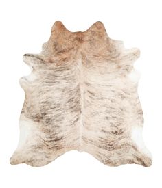 a brown and white cowhide rug on a white background