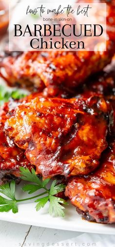 barbecued chicken on a white plate with parsley